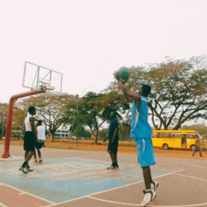 Peter Dankwa practicing with the Presec basketball team during the Sprite Ball Competition at the University of Ghana
