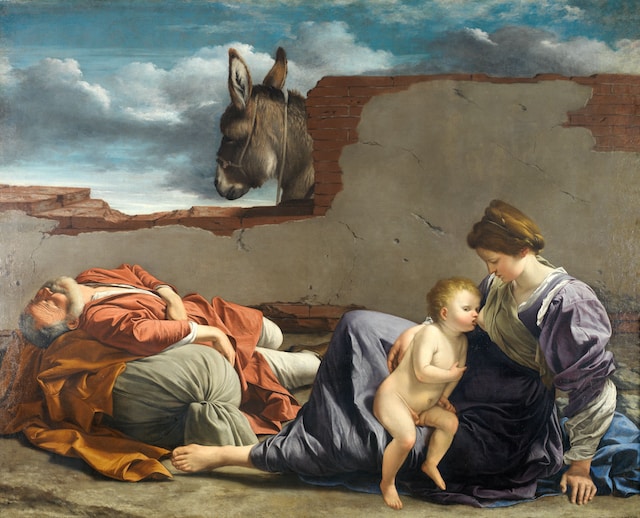 virgin mary feeding baby jesus in a manger